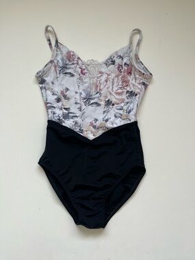 Floral and black Danse De Paris leotard in a size women’s xs